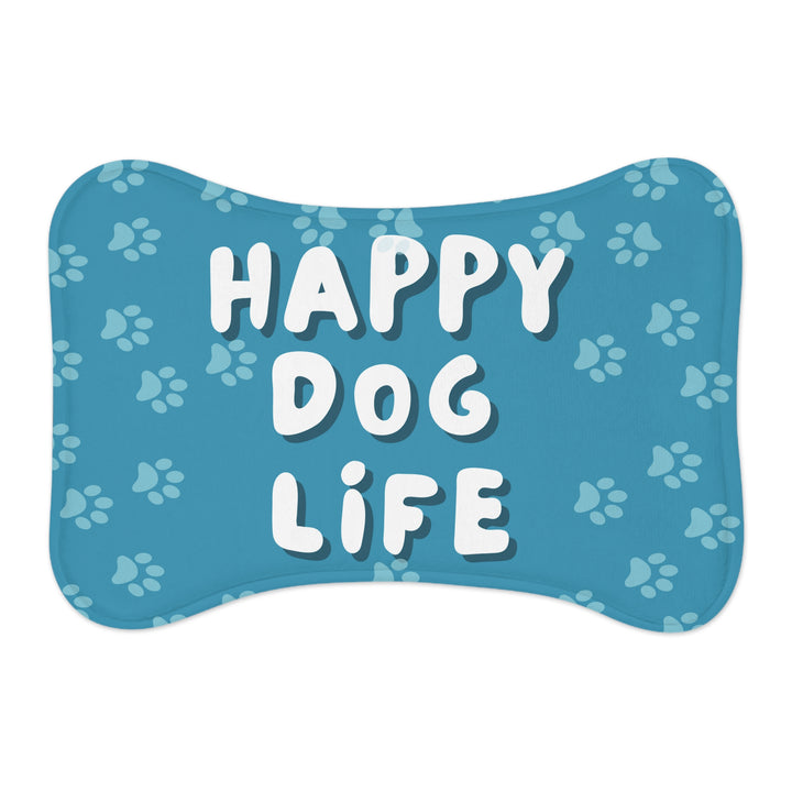 Bone-shaped Happy Dog Life feeding mat with paw prints on blue