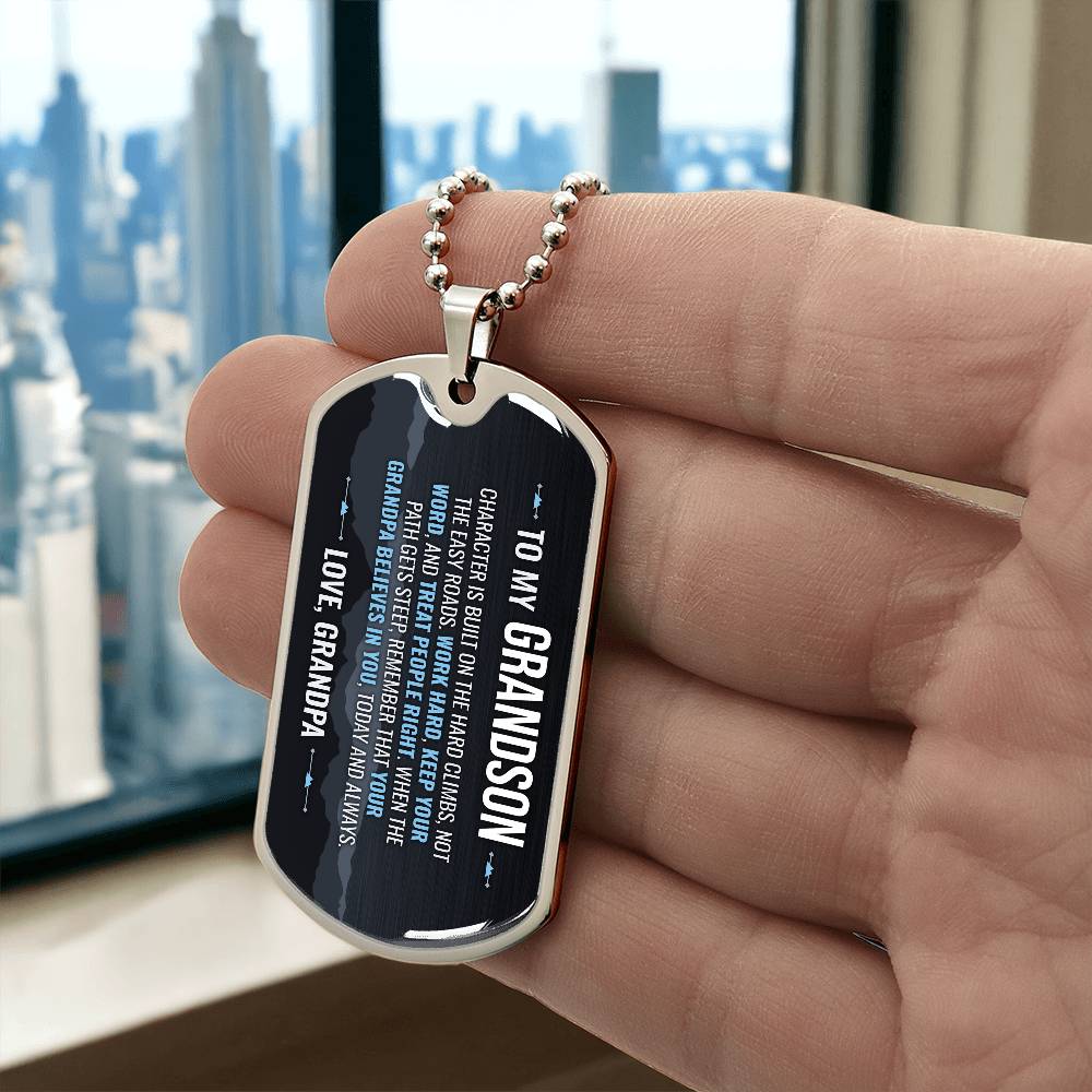 To My Grandson Necklace from Grandpa – silver dog tag held in hand to show size