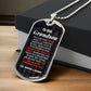 To Our Grandson Necklace from Grandma & Grandpa – silver dog tag necklace resting on a gift box