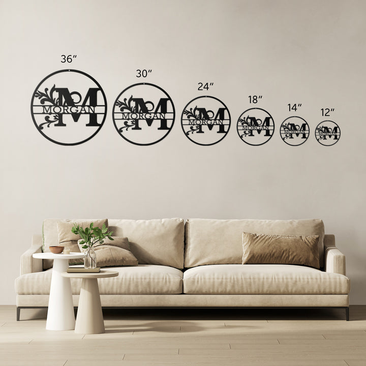 Black family name monogram metal sign size comparison from 36 in down to 12 in over a sofa