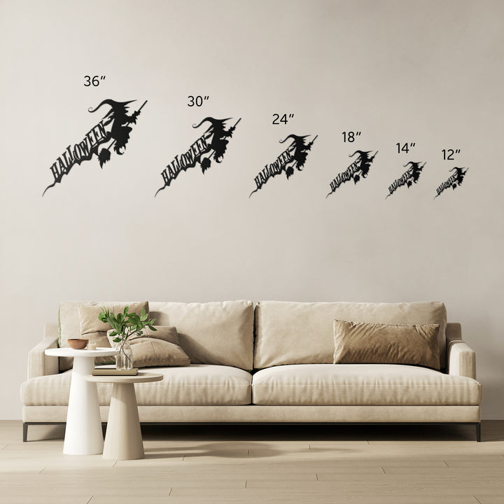 Size comparison of the witch metal sign from 36 in down to 12 in over a sofa