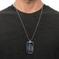 To My Grandson Necklace from Grandpa – silver dog tag necklace worn with a dark t-shirt