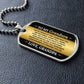 To My Grandson Necklace from Grandpa – dog tag necklace laid flat on a dark background