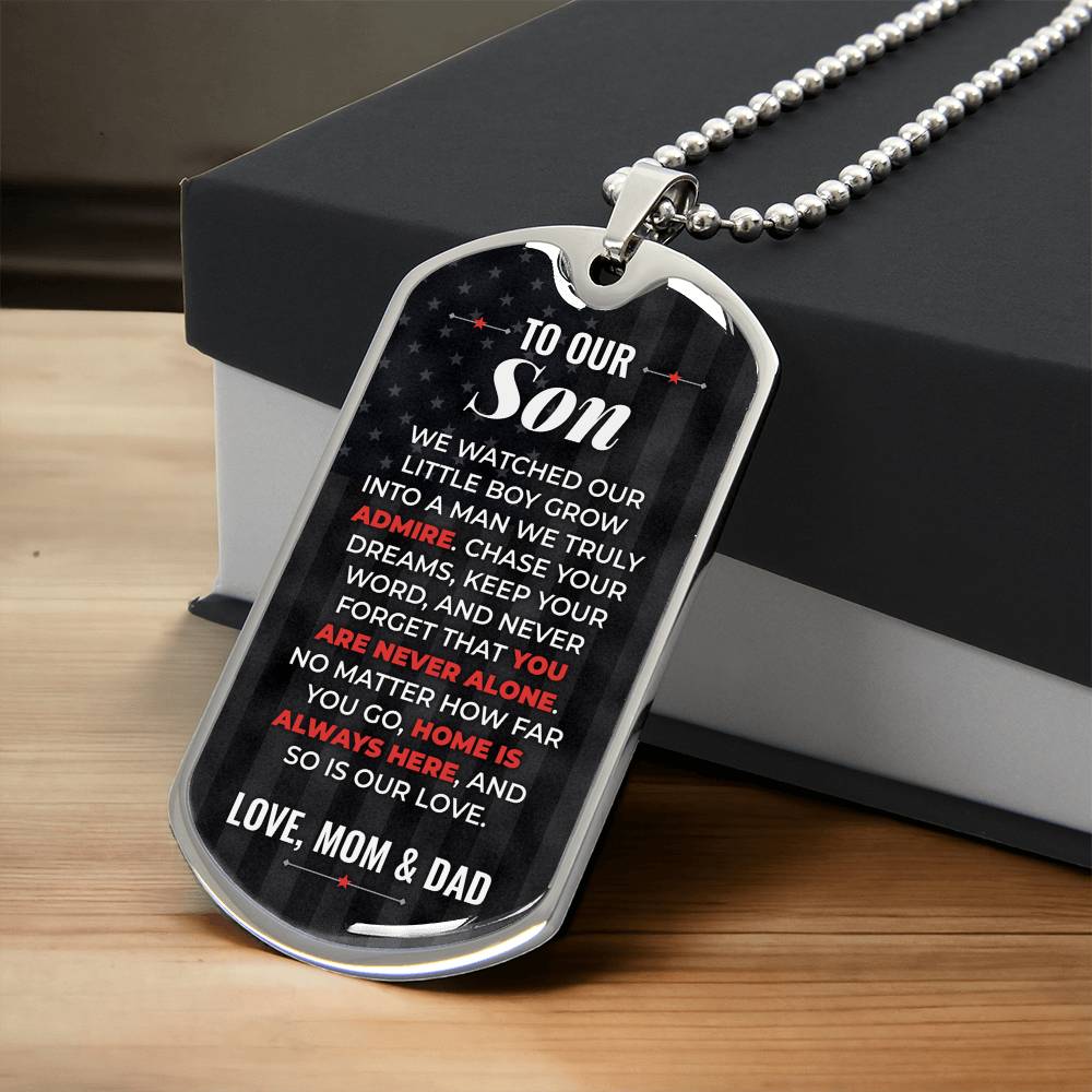 To Our Son Necklace from Mom & Dad – silver dog tag necklace resting on a gift box