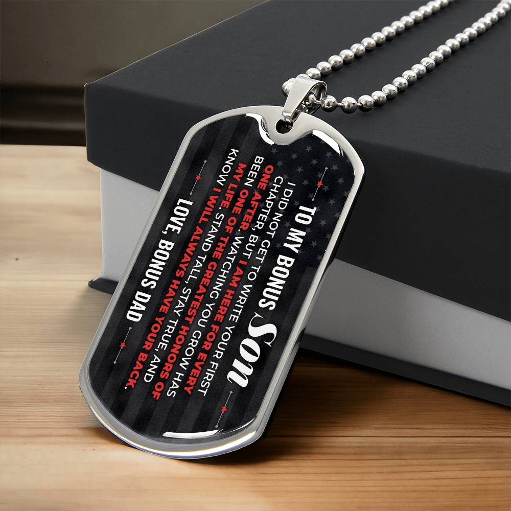 To My Bonus Son Necklace from Stepdad – silver dog tag necklace resting on a gift box