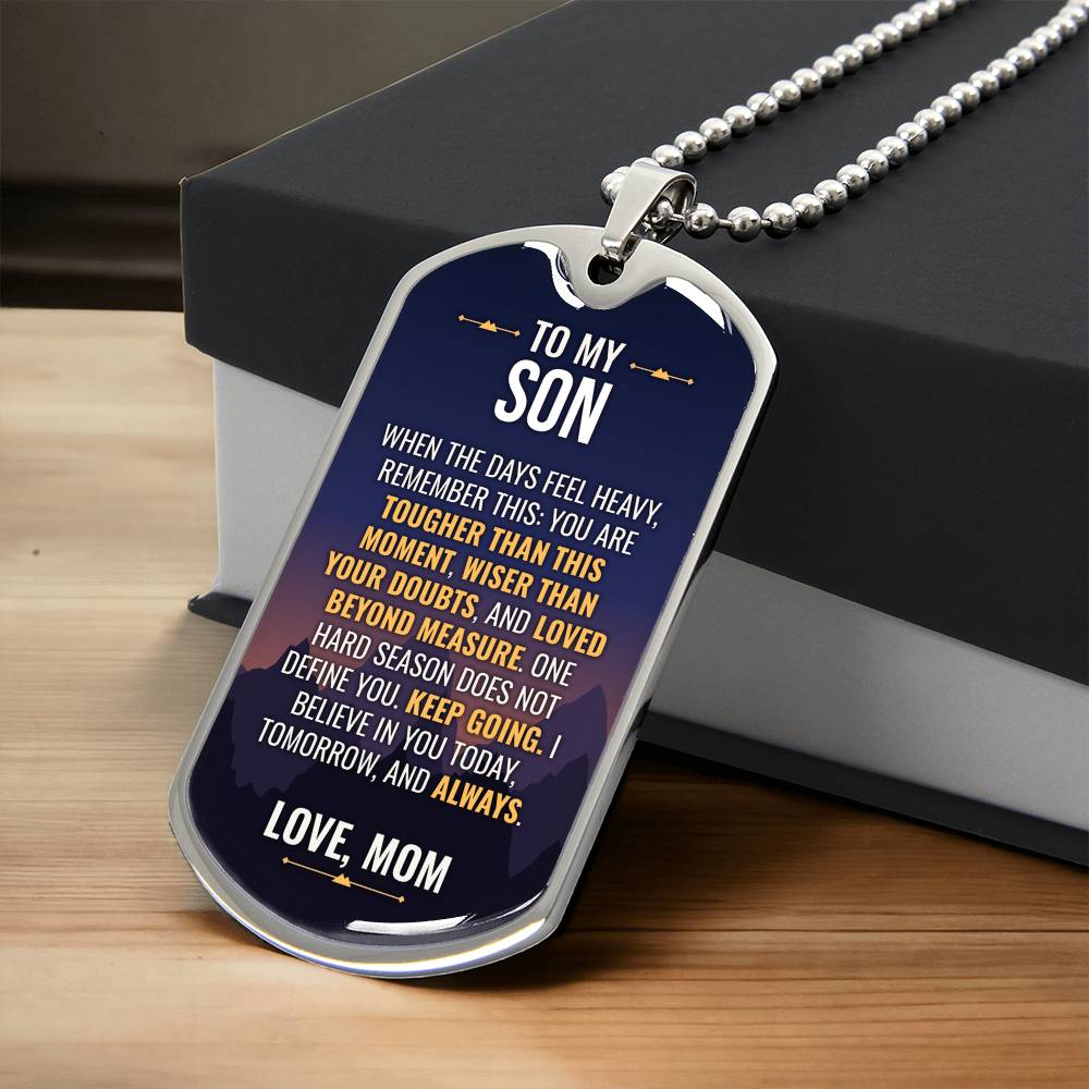 To My Son Necklace from Mom – silver dog tag necklace resting on a gift box