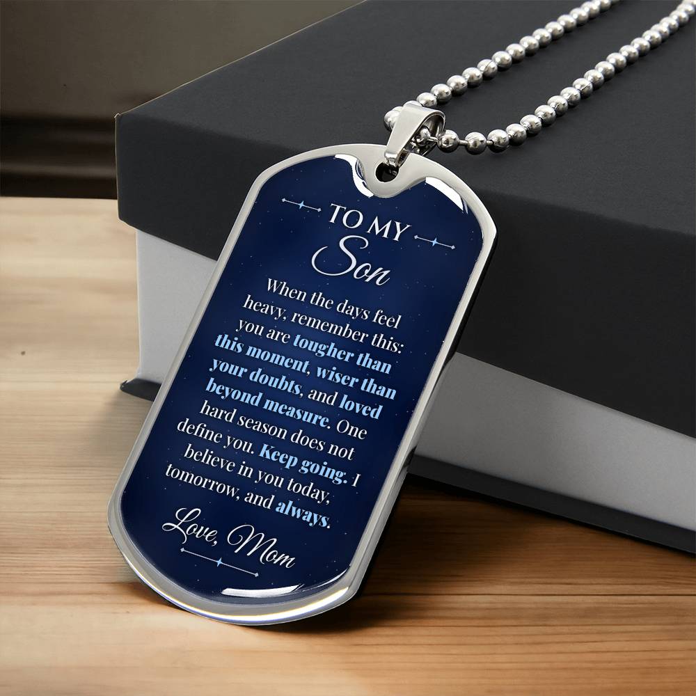 To My Son Necklace from Mom – silver dog tag necklace resting on a gift box