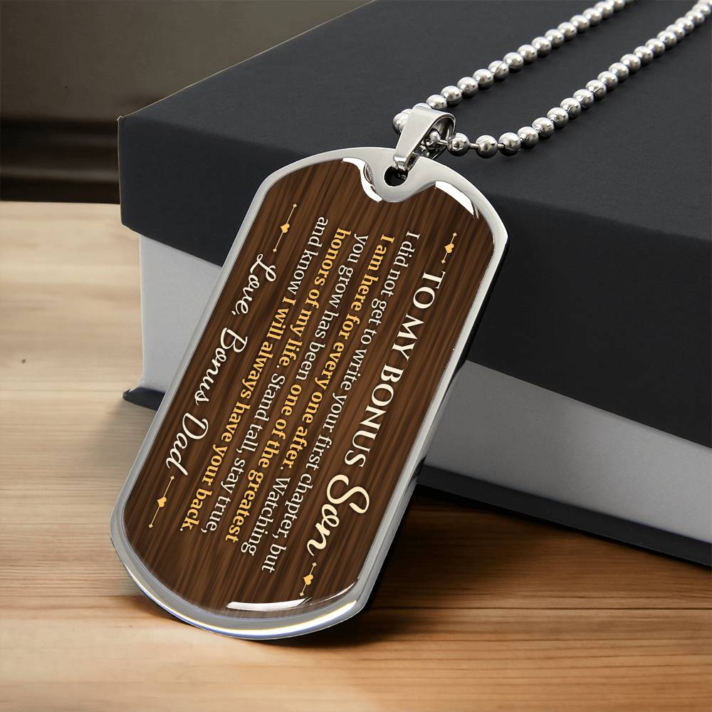 To My Bonus Son Necklace from Stepdad – silver dog tag necklace resting on a gift box