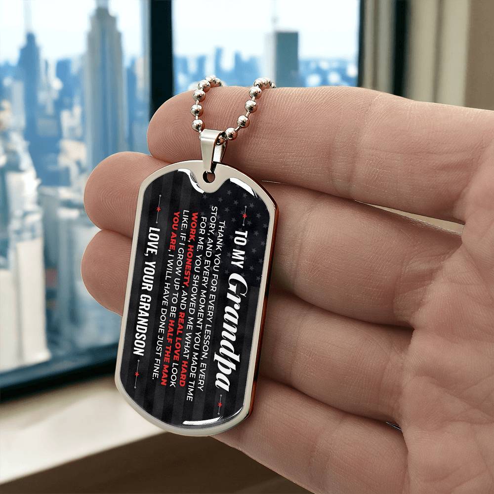 To My Grandpa Necklace from Grandson – silver dog tag held in hand to show size