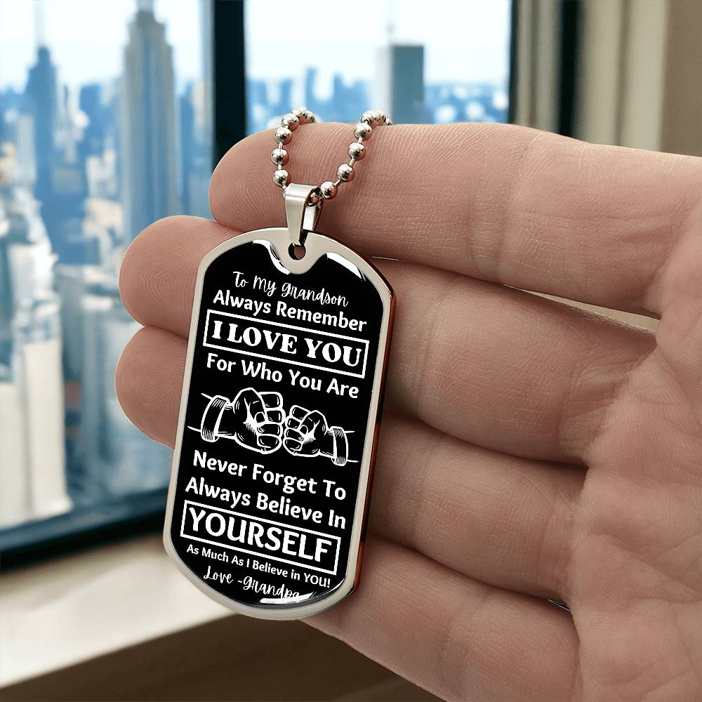 To My Grandson, From Grandpa Dog Tag – silver dog tag held in hand to show size