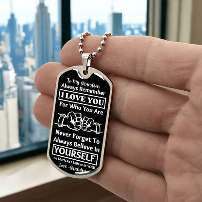 To My Grandson, From Grandpa Dog Tag – silver dog tag held in hand to show size