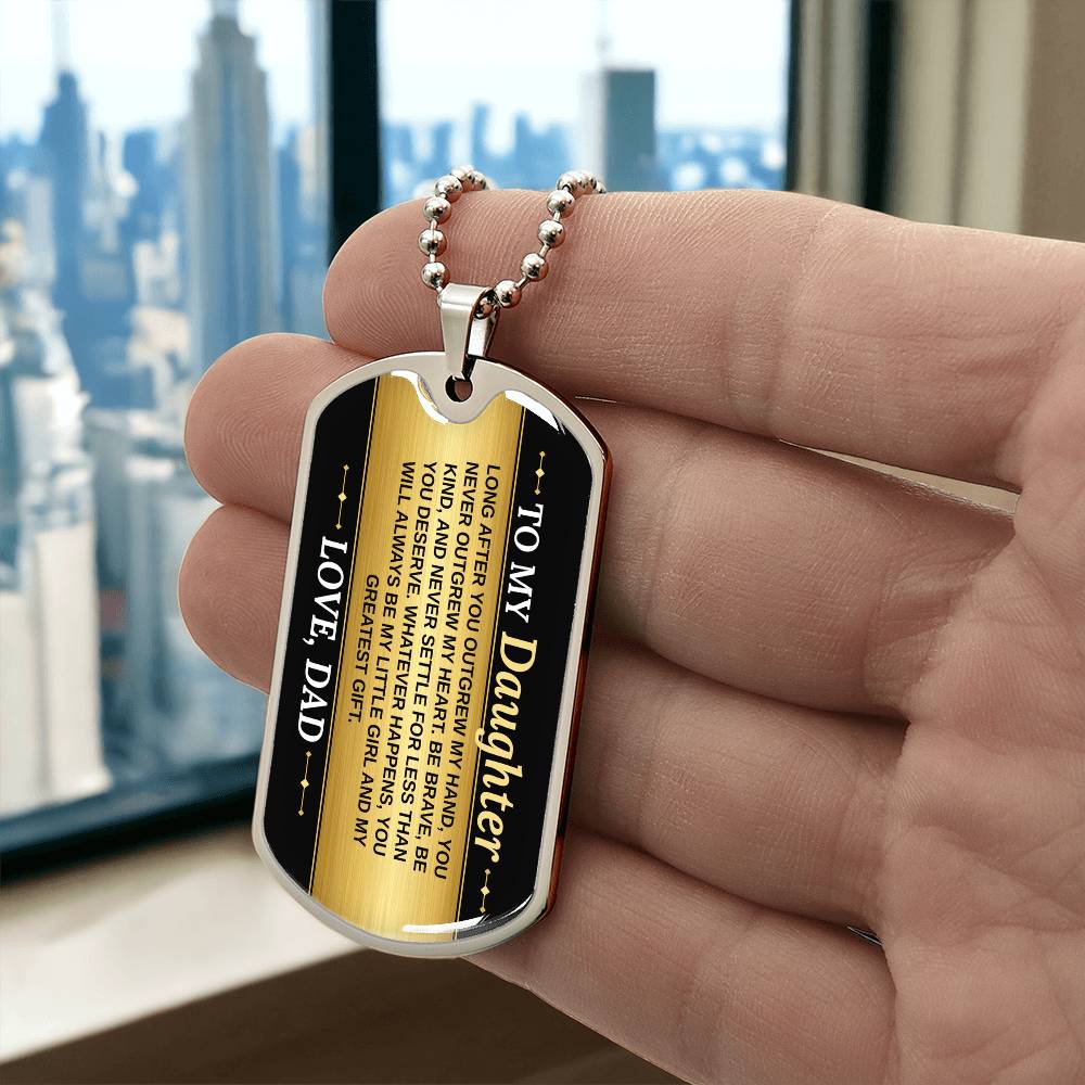 To My Daughter Necklace from Dad – silver dog tag held in hand to show size