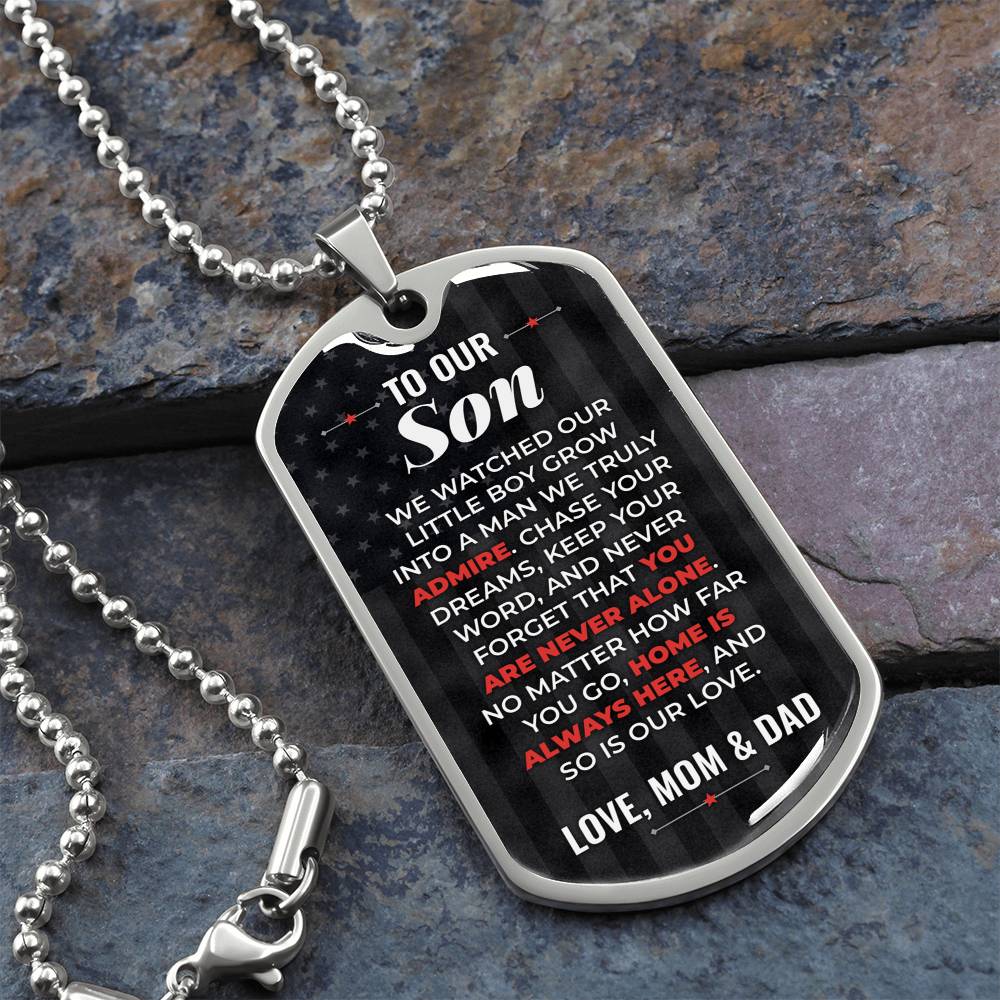 To Our Son Necklace from Mom & Dad – silver dog tag necklace on slate with military ball chain