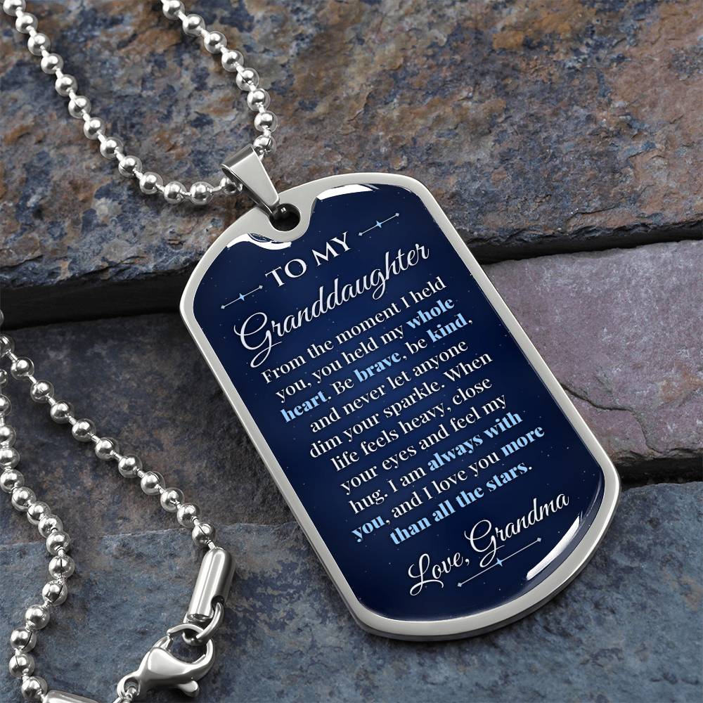 To My Granddaughter Necklace from Grandma – silver dog tag necklace on slate with military ball chain