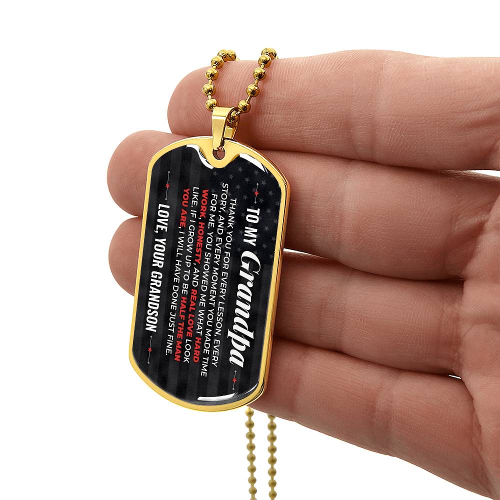 To My Grandpa Necklace from Grandson – gold dog tag held in hand to show size