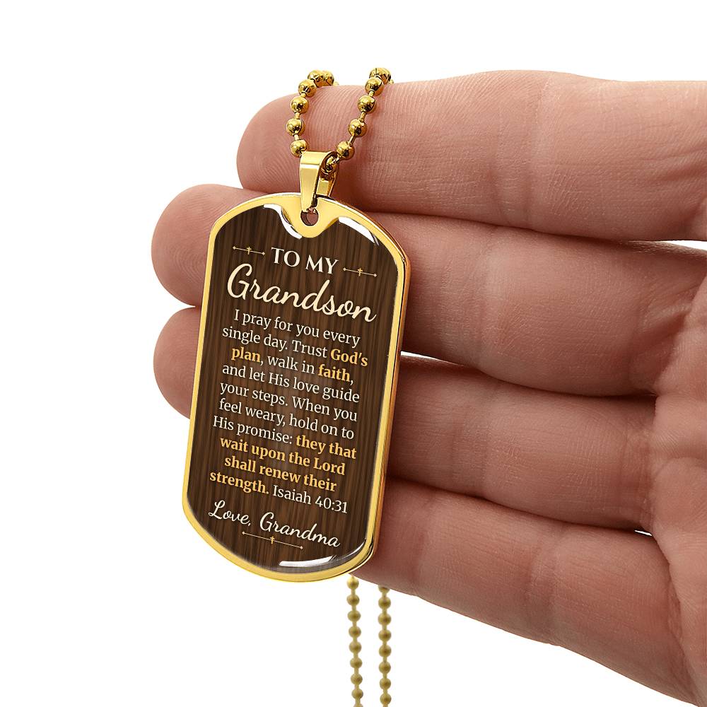 To My Grandson Necklace from Grandma – gold dog tag held in hand to show size