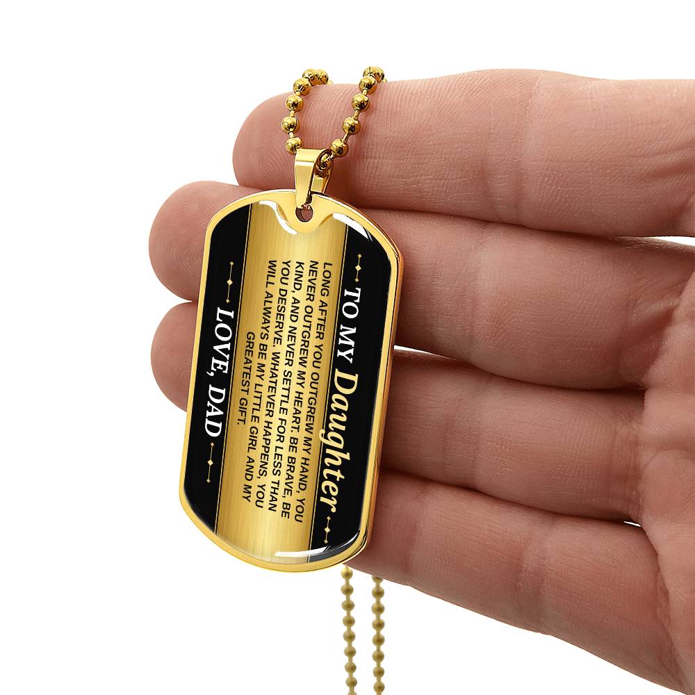 To My Daughter Necklace from Dad – gold dog tag held in hand to show size
