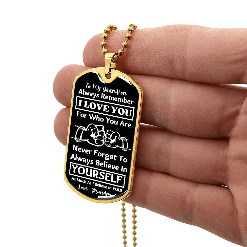 To My Grandson, From Grandpa Dog Tag – gold dog tag held in hand to show size