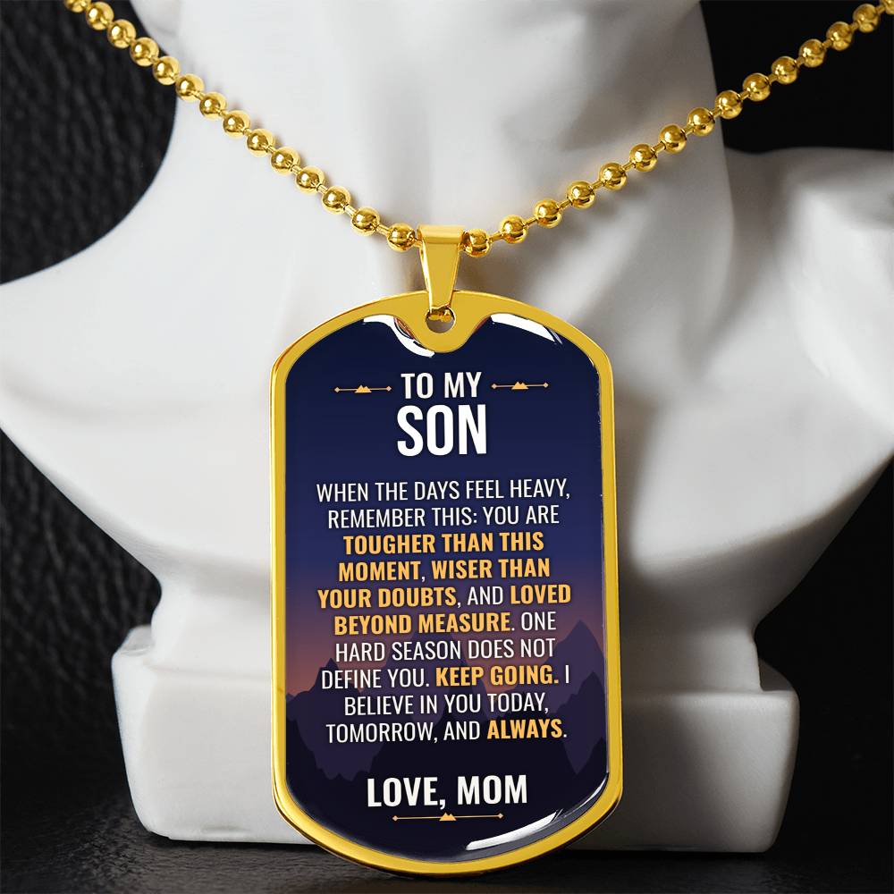 To My Son Necklace from Mom – gold dog tag necklace displayed on a bust