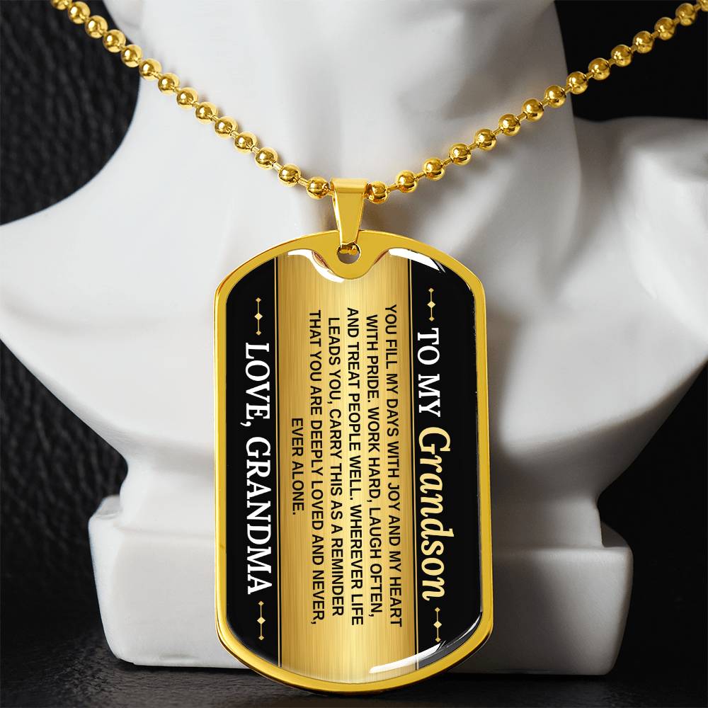 To My Grandson Necklace from Grandma – gold dog tag necklace displayed on a bust