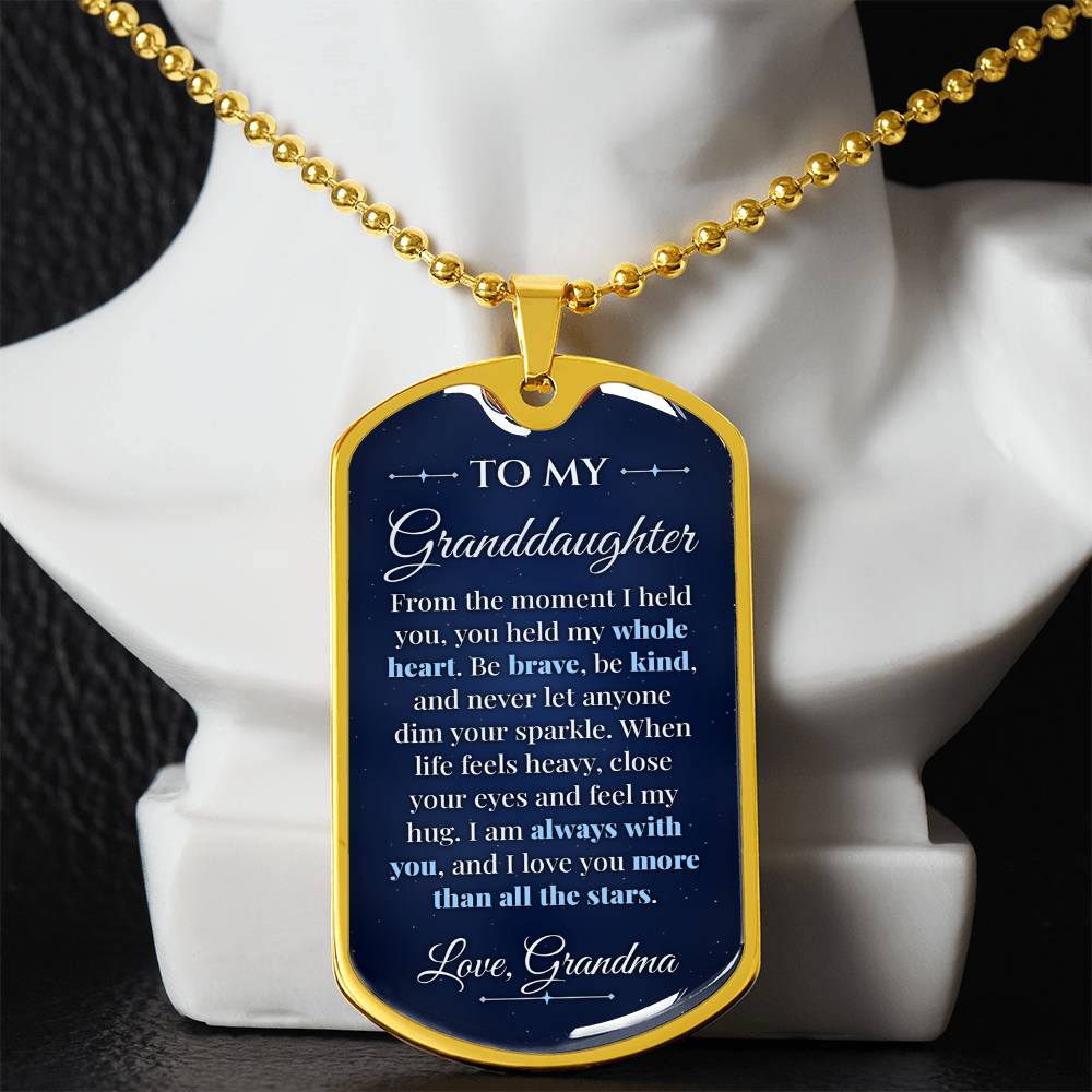 To My Granddaughter Necklace from Grandma – gold dog tag necklace displayed on a bust