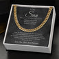 Close-up of a gold-finish Cuban link chain over the charcoal script To My Son card in a white gift box