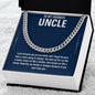 Uncle chain necklace on message card in open box on a white rug