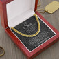 Gold-finish Cuban link chain on the charcoal To My Son card in an open mahogany-style luxury box on a wood table