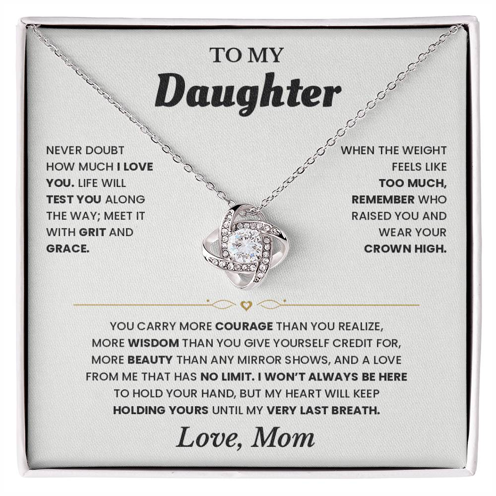 Love Knot necklace on the white To My Daughter card from Mom in an open white gift box, front view