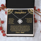 Black and gold To My Daughter card from Dad and Love Knot necklace in a white gift box with red berries