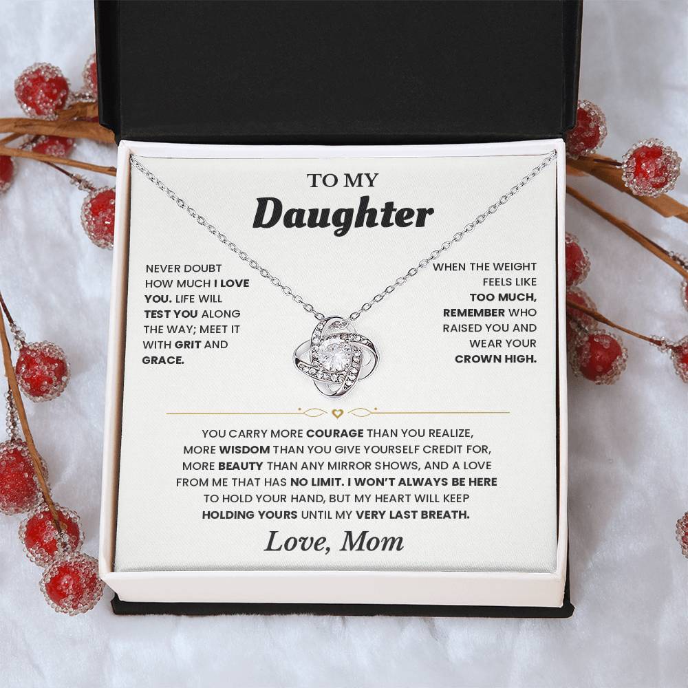 White To My Daughter card from Mom and Love Knot necklace in a white gift box with red berries