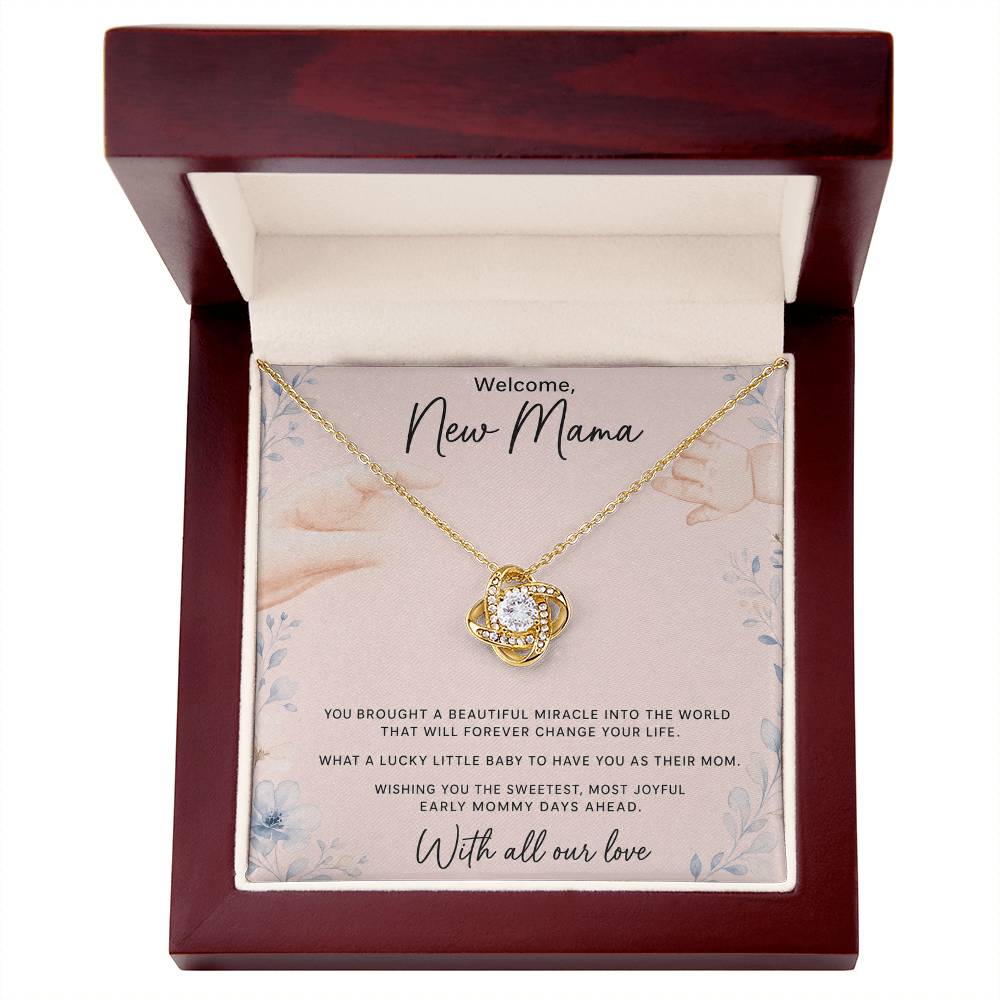 Yellow gold Love Knot necklace in mahogany LED luxury box with Welcome New Mama card — oezzo