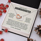 Cream Granddaughter card from Grandpa with the hearts necklace in a white gift box with red berries and pinecones
