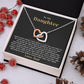Black and gold To My Daughter card from Dad with the Interlocking Hearts necklace in a white gift box with red berries and pinecones