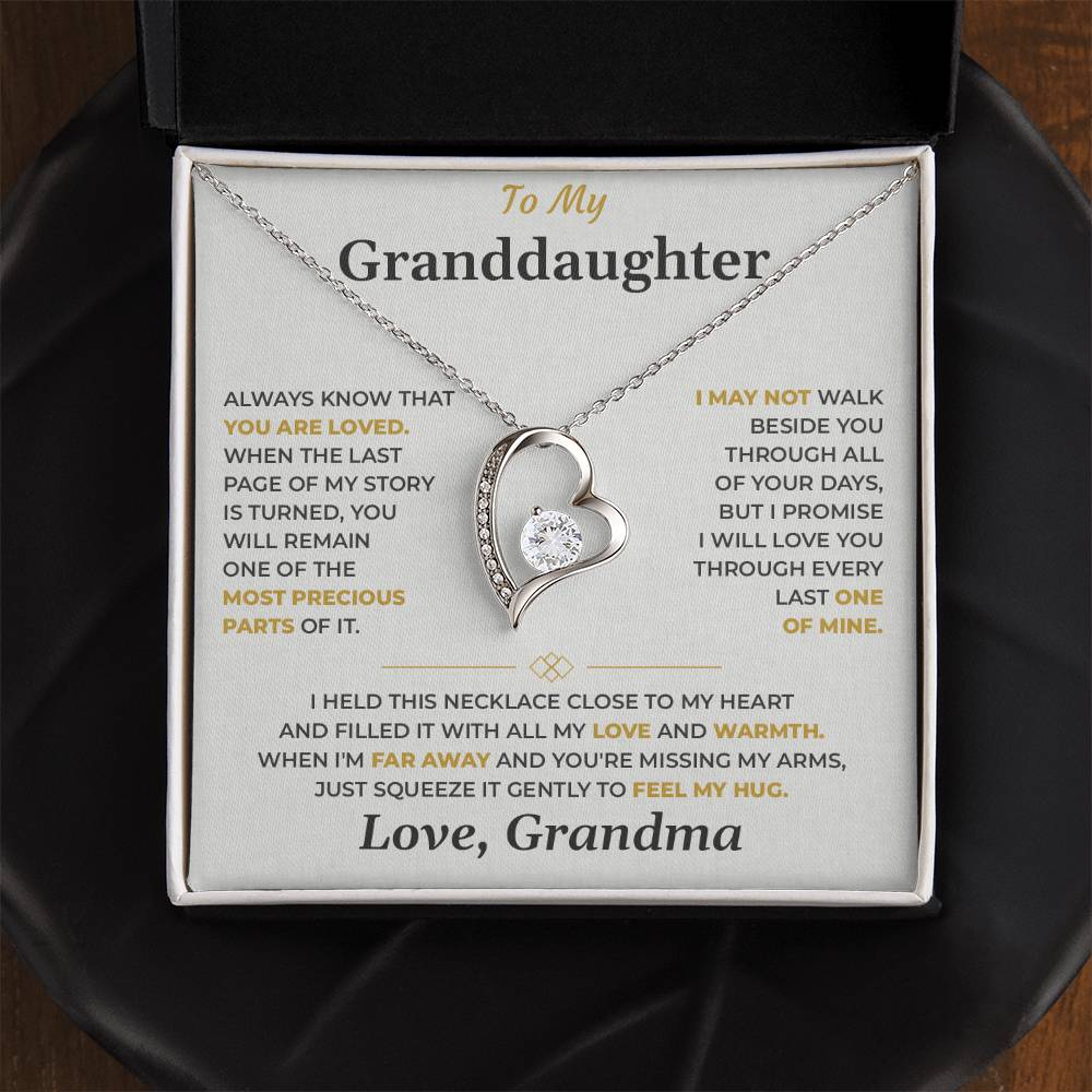 Open black gift box with the Forever Love heart necklace on the soft gray To My Granddaughter card from Grandma
