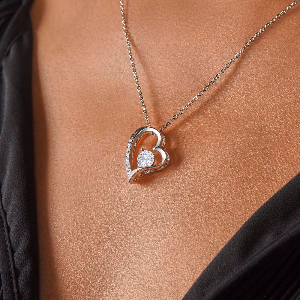 Forever Love heart pendant worn with a black top, close-up (To My Bonus Daughter set)