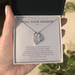 In memory of dog necklace held in gift box