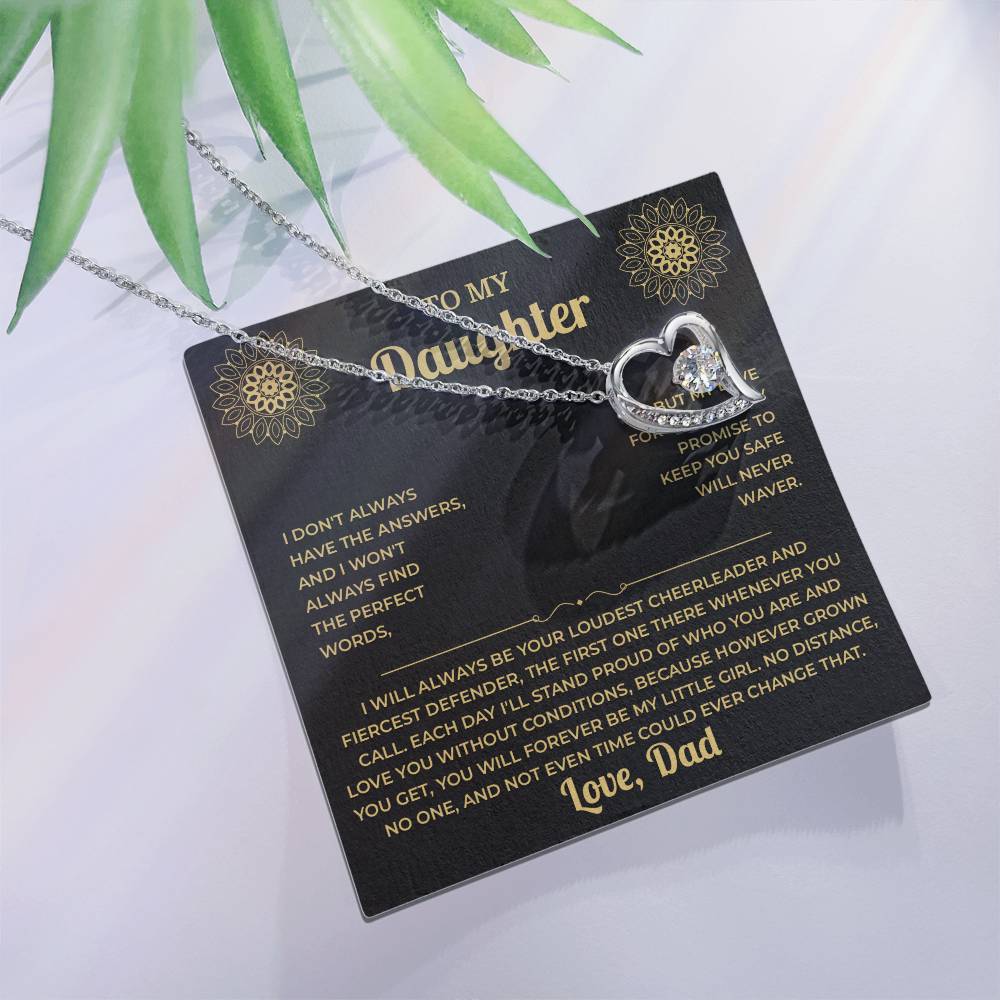 Forever Love heart necklace on the black and gold To My Daughter card from Dad with green leaves, white background