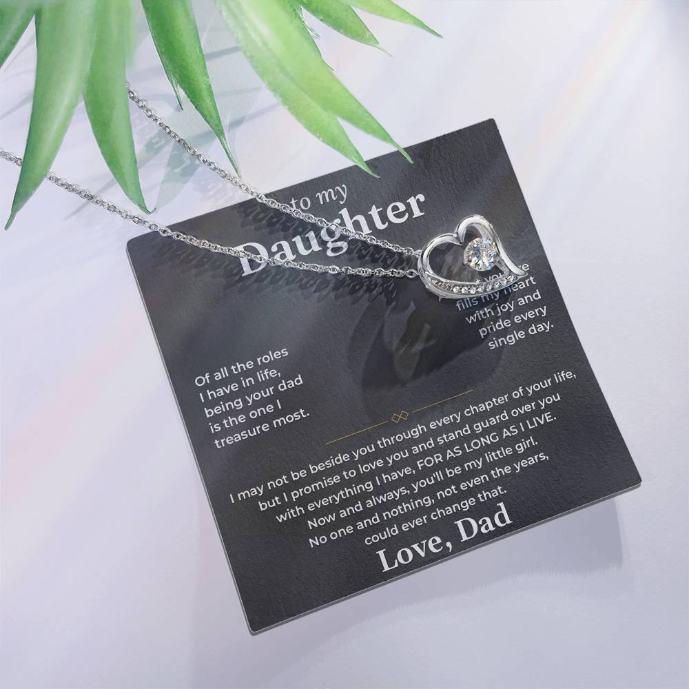 Forever Love heart necklace on the charcoal To My Daughter card from Dad with green leaves, white background