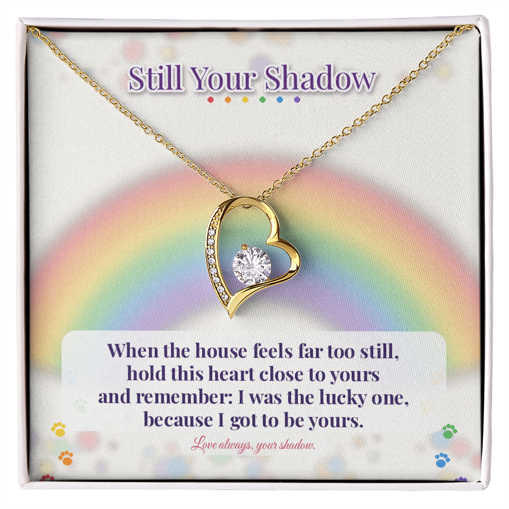 Dog sympathy gift: yellow gold heart necklace on rainbow card