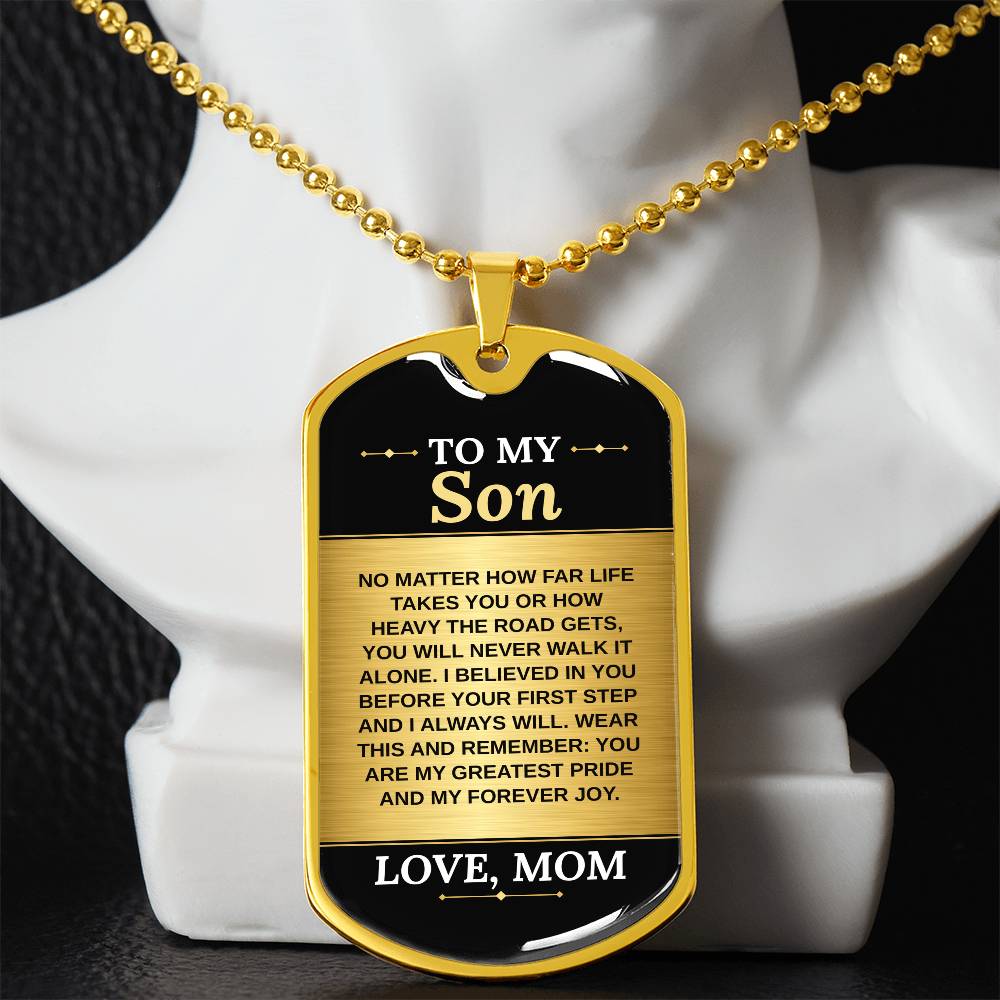 To My Son Necklace from Mom – gold dog tag necklace displayed on a bust