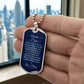 To My Son Necklace from Mom – silver dog tag held in hand to show size