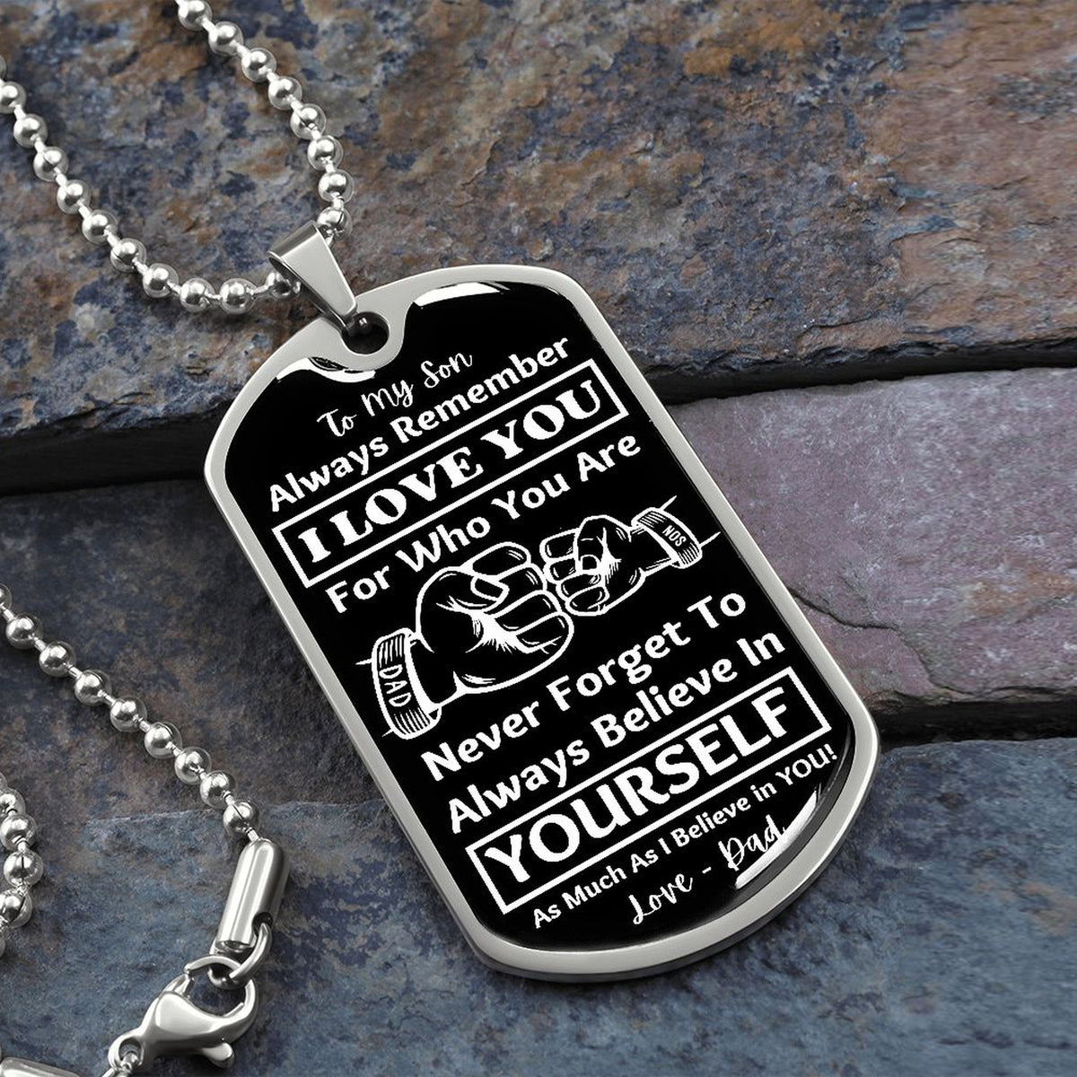 Silver Believe in Yourself son dog tag necklace on slate stone