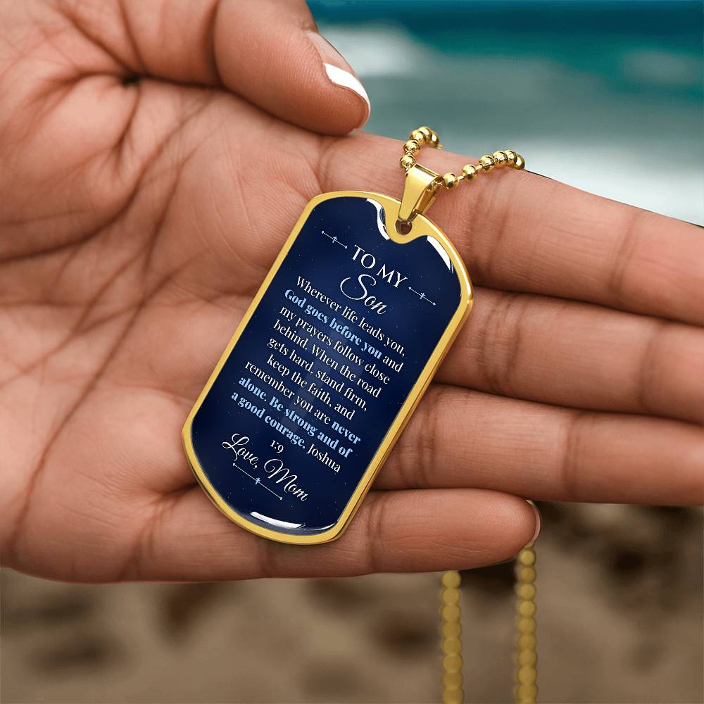 To My Son Necklace from Mom – gold dog tag held in hand to show size