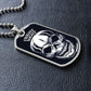 Silver Fright Night skull dog tag lying on black leather