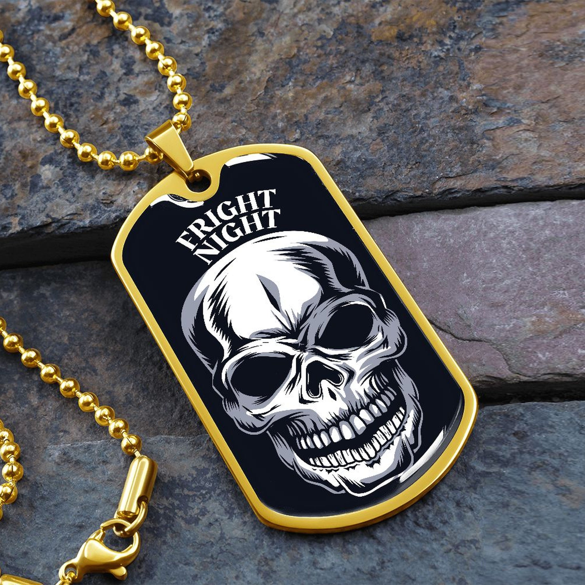 Fright Night skull dog tag necklace with 18k gold finish on slate stone