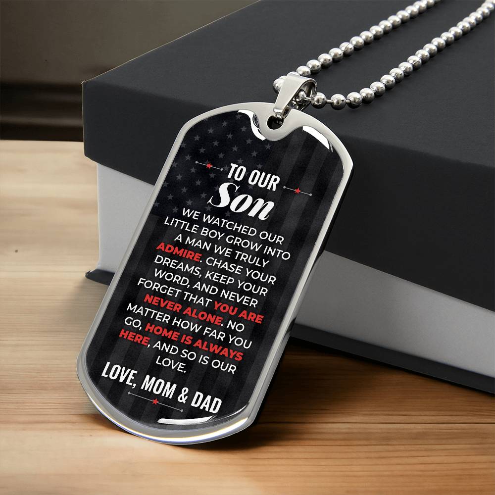 To Our Son Necklace from Mom & Dad – silver dog tag necklace resting on a gift box