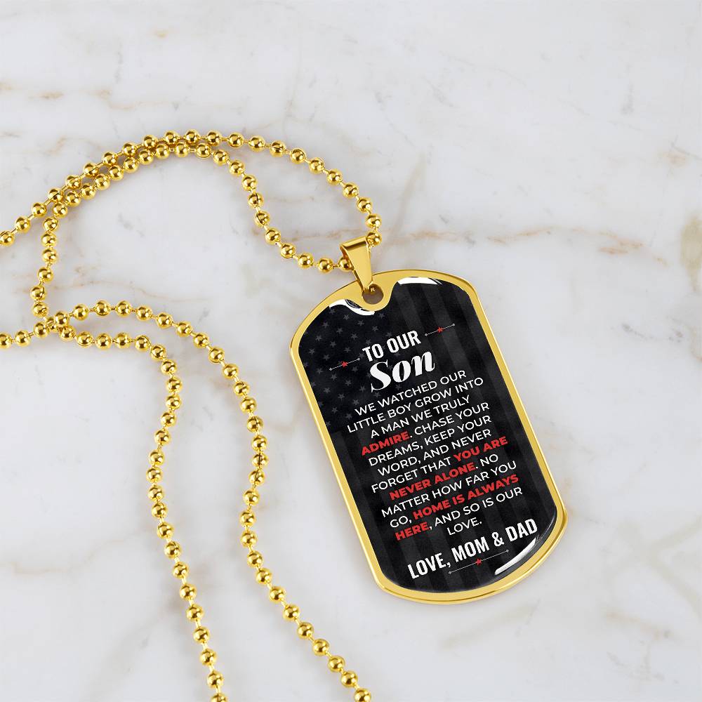 To Our Son Necklace from Mom & Dad – 18k gold finish dog tag necklace on white marble