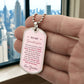 To My Granddaughter Necklace from Grandma – silver dog tag held in hand to show size