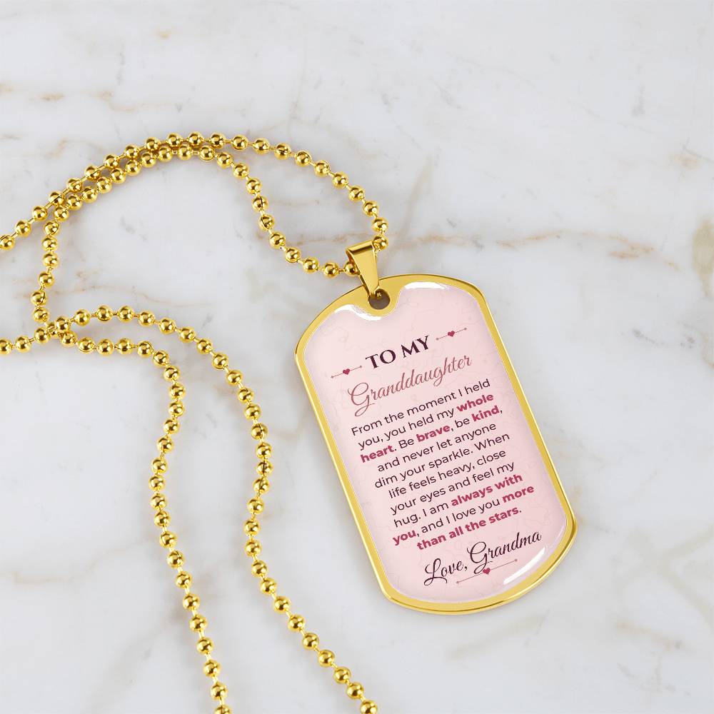 To My Granddaughter Necklace from Grandma – 18k gold finish dog tag necklace on white marble